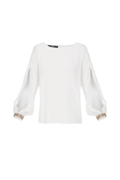 BLUSA CON POLSINI