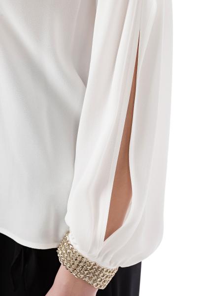 BLUSA CON POLSINI