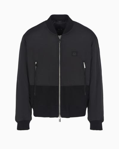 Giacca bomber in tessuto opaco con inserto in velluto