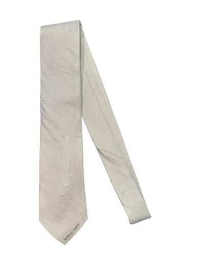 Cravatta uomo MK in seta Jacquard con microfantasia